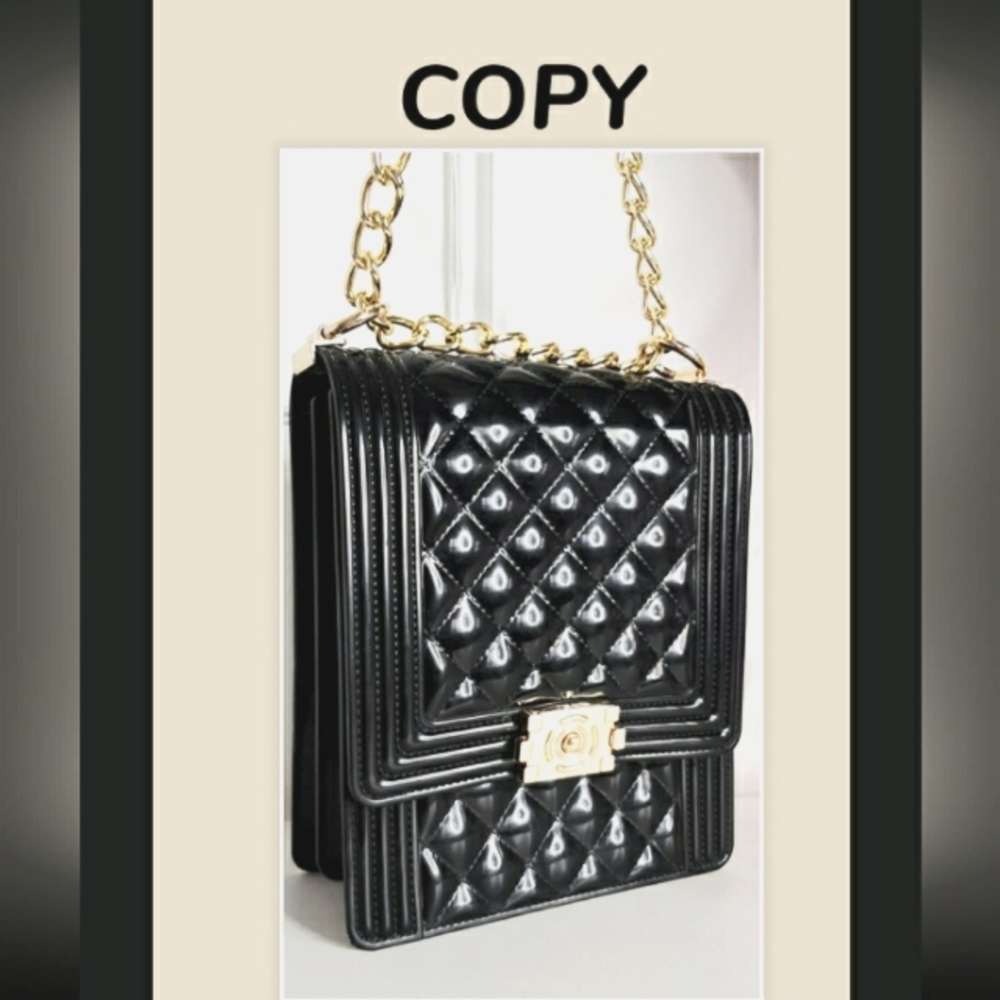 Jenna Fold Over Clasp Bag with Chain Strap faux leather in Black.